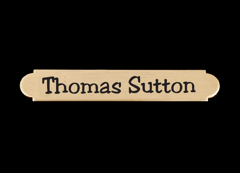 Personalized adhesive back brass engraved picture frame nameplate.