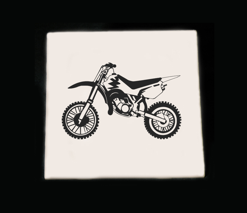 Personalized ceramic trivet with an engraved motorcycle design and custom text.