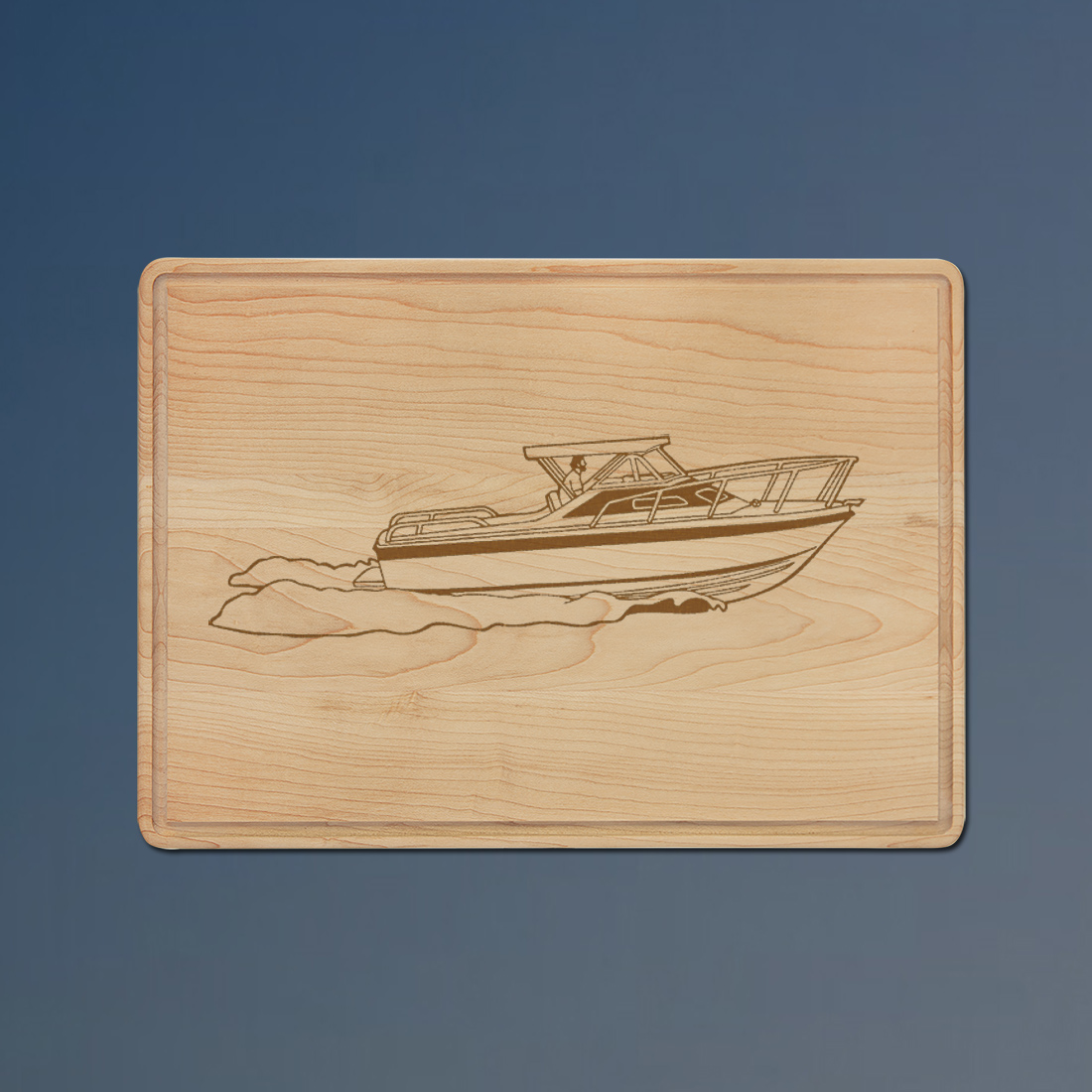 Custom engraved maple drip ring boat cutting board with a boat design and personalized text. 50+ boat designs to choose from.