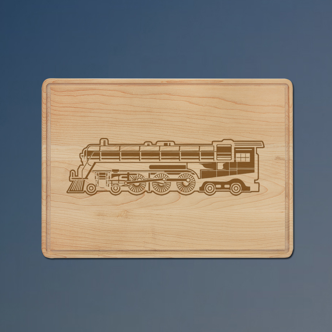 Custom engraved maple drip ring train cutting board with a train design and personalized text. 85+ train designs to choose from.