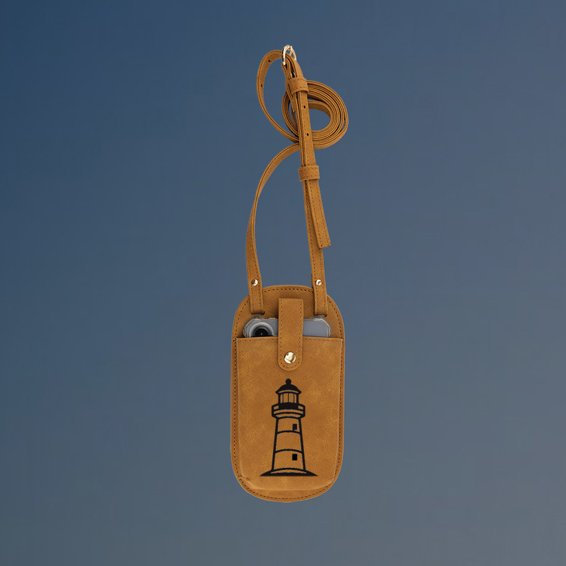 Personalized essential crossbody bag with your choice of lighthouse design and custom engraved text.
