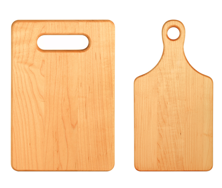 Personalized maple cutting board with custom engraved train design.