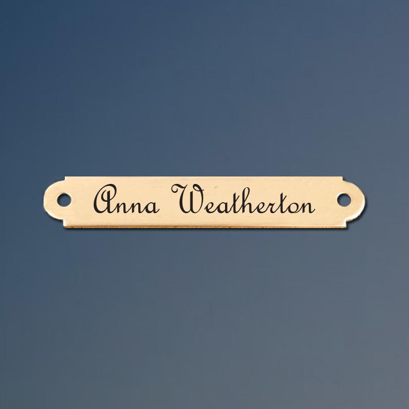 Custom engraved brass horse saddle nameplate.