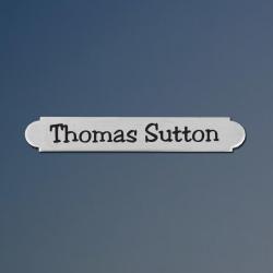 Nickle silver engraved adhesive back nameplate.