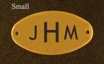 Small brass engraved tact trunk nameplate.