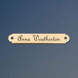 Personalized brass horse halter nameplate.