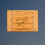 Custom engraved bamboo airplane cutting board with engraved airplane design and personalized text. 85+ airplane designs to choose from.