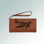 Custom engraved airplane silhouette leatherette pilot wallet with a removable wrist strap. 85+ airplane designs to choose from.
