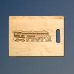 Custom engraved maple train cutting board with engraved train design of your choice.