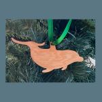 Laser cut dolphin wood Christmas ornament comes in 3 sizes and a variety of wood types. Dolphin Ornament